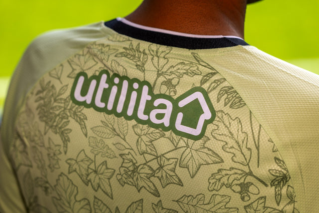 Luton Town's 3rd kit with Reflo featuring hand drawn leaf designs. The image shows the back of the shirt