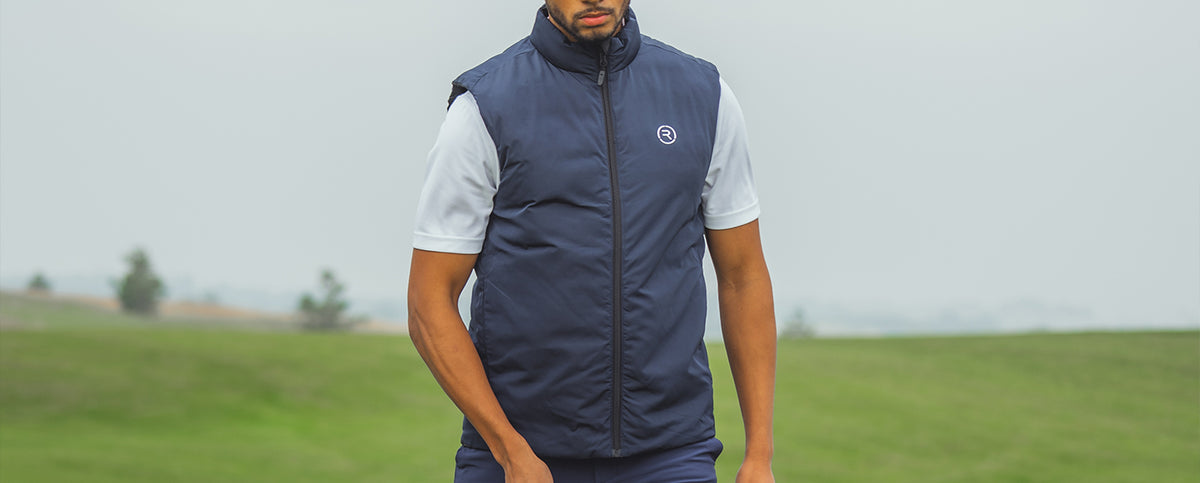 A man wearing a Reflo gilet while playing golf